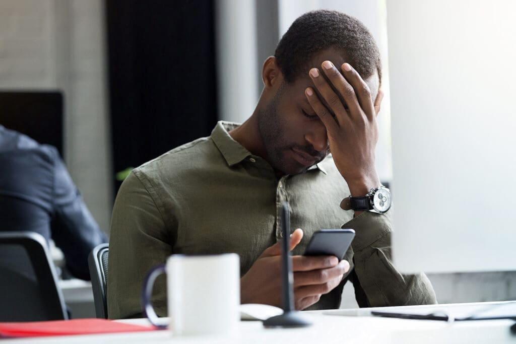 Stressed business man on phone